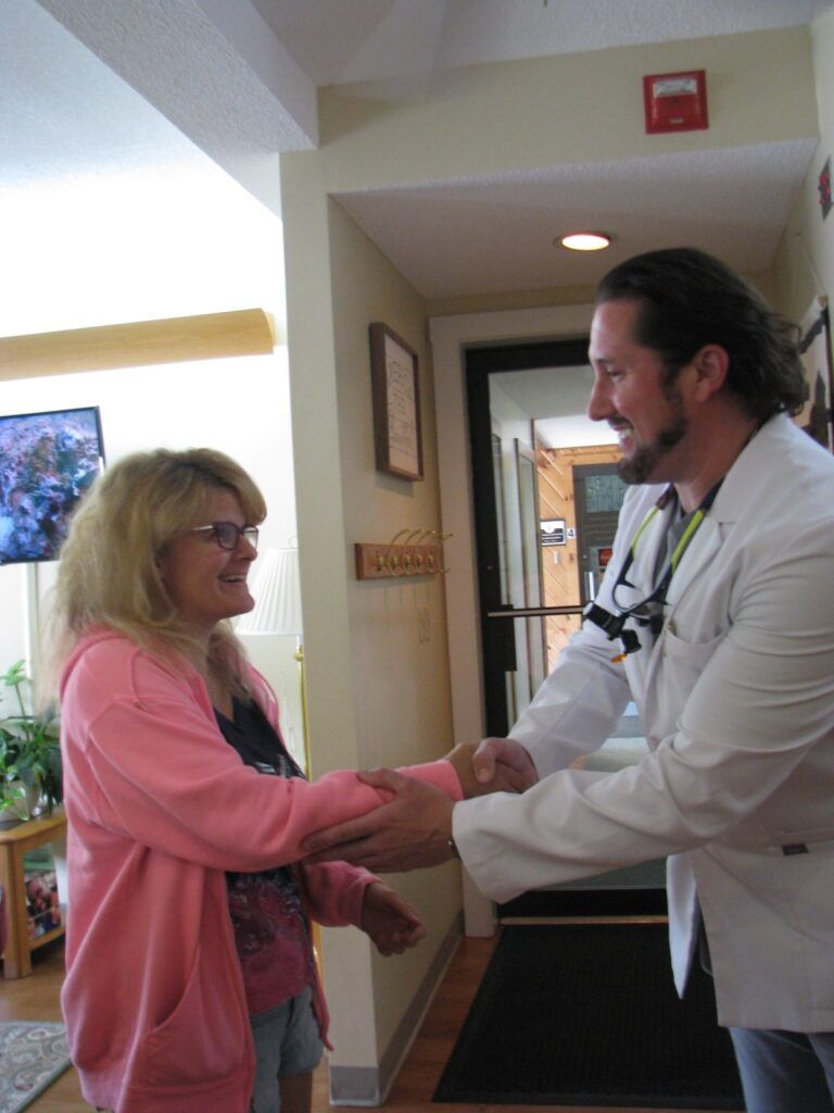 Dr. Nicholas Ciancarelli handshake with patient