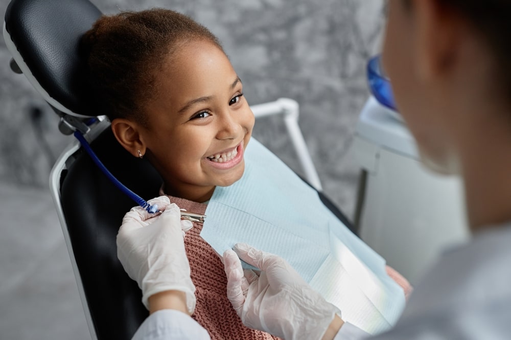 Little Girl Smiling at Dentist