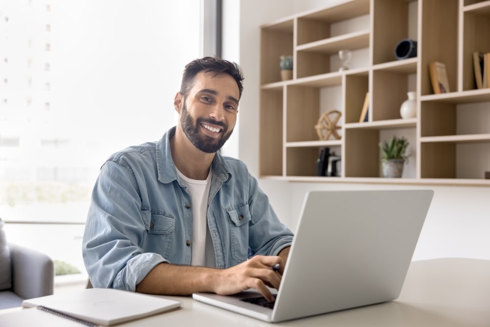 Young Professional Man Working on Laptop