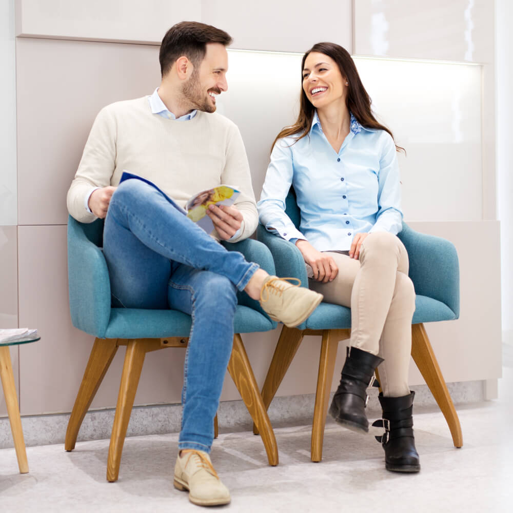 Happy Couple in Waiting room